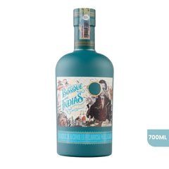 Botella de Gin Bosque de Indias de 700ml sobre fondo blanco. La botella tiene un acabado de color azul verdoso mate y presenta una etiqueta detallada con ilustraciones estilo vintage, mapas y la figura de un explorador.