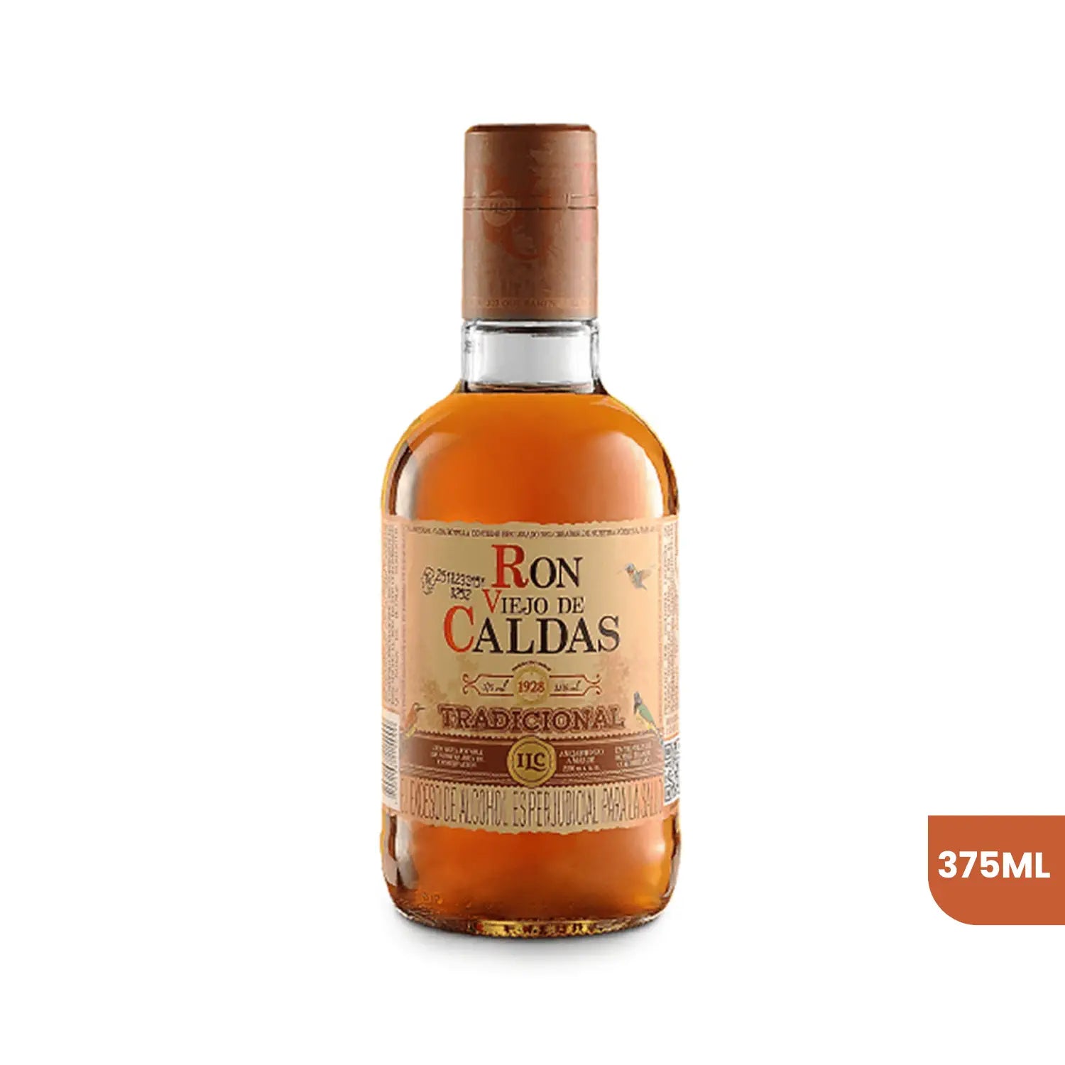 Botella de Ron Viejo de Caldas Tradicional de 375ml sobre fondo blanco. La botella de cristal muestra el licor ámbar oscuro y una etiqueta clásica en tonos dorados con el logo distintivo de la marca e ilustraciones de aves.